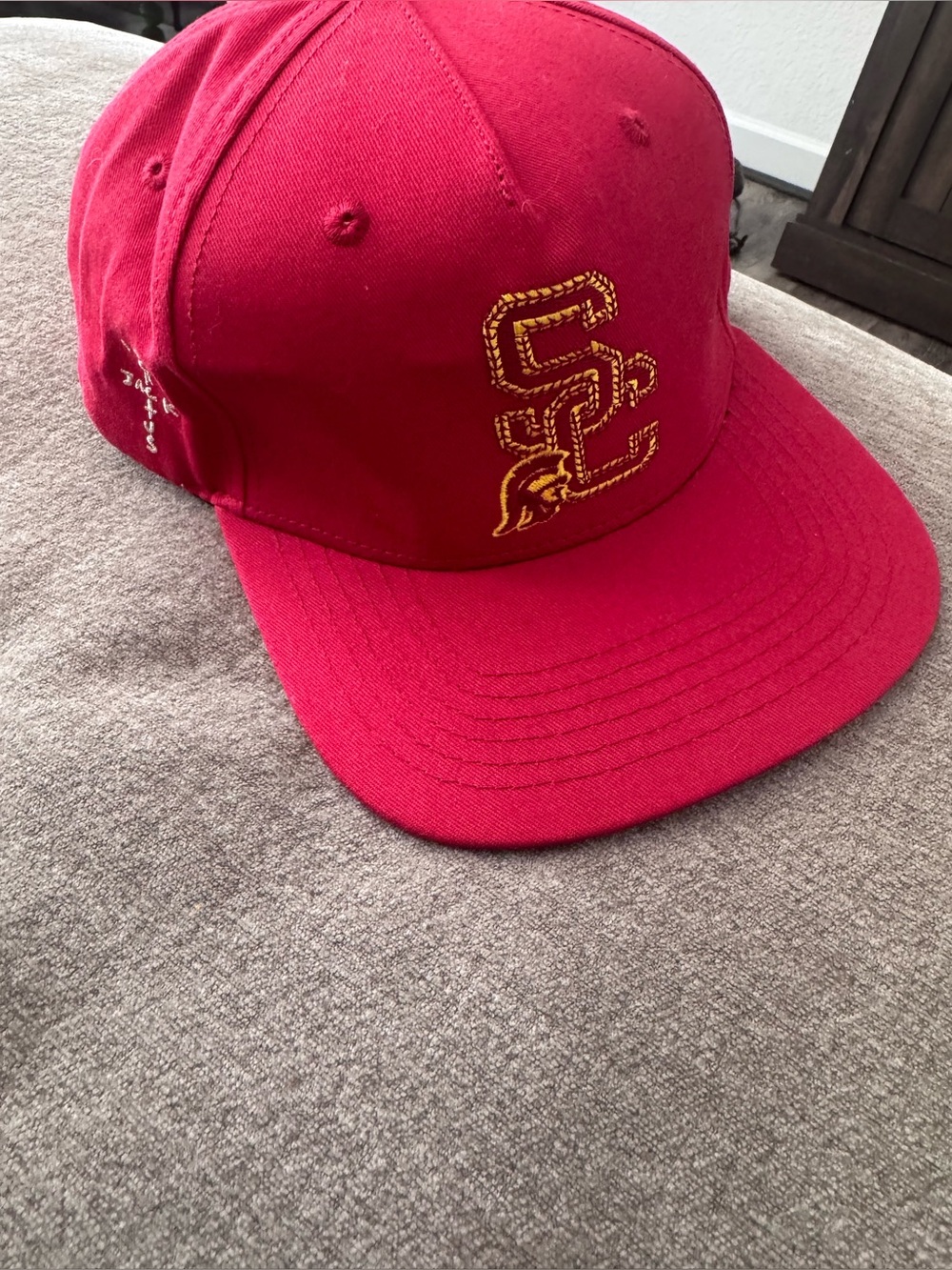 red cactus jack snap back hat